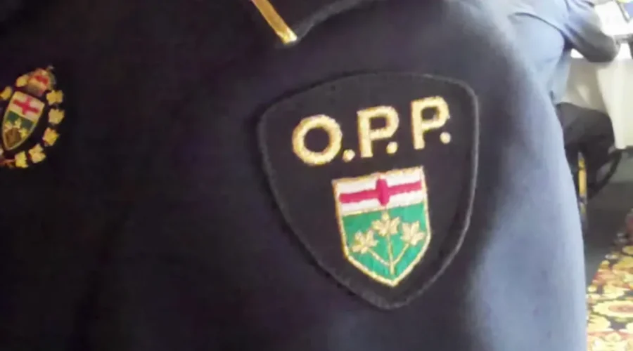Vehicle Nearly Strikes OPP Officer