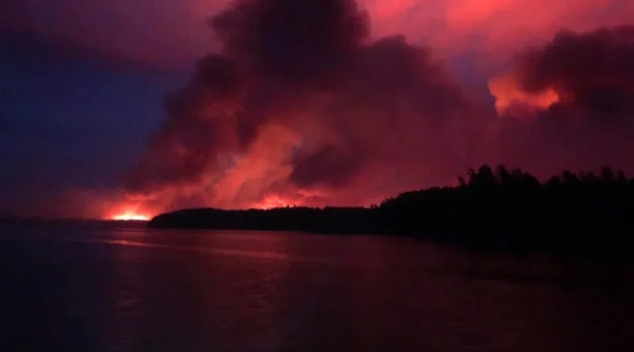 Fire Near Pikangikum Grows