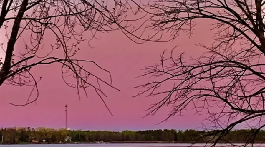 Moonlit sunset over the water