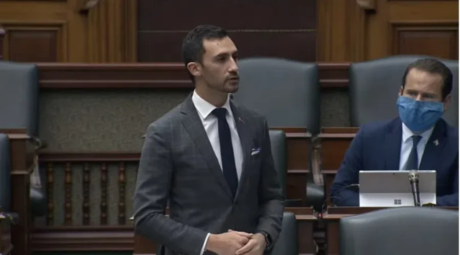 Education Minister Defends School COVID Strategy