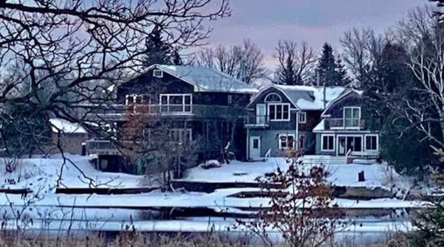 Homes Along The Water In Winter