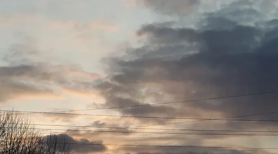 Sunset Through Dark Clouds